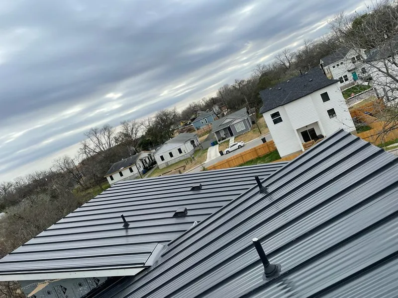 Standing seam metal roof panels with vents for Skylight Repair in Redmond